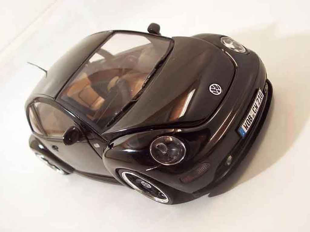 Volkswagen New Beetle 1/18 Solido men in black diecast model cars