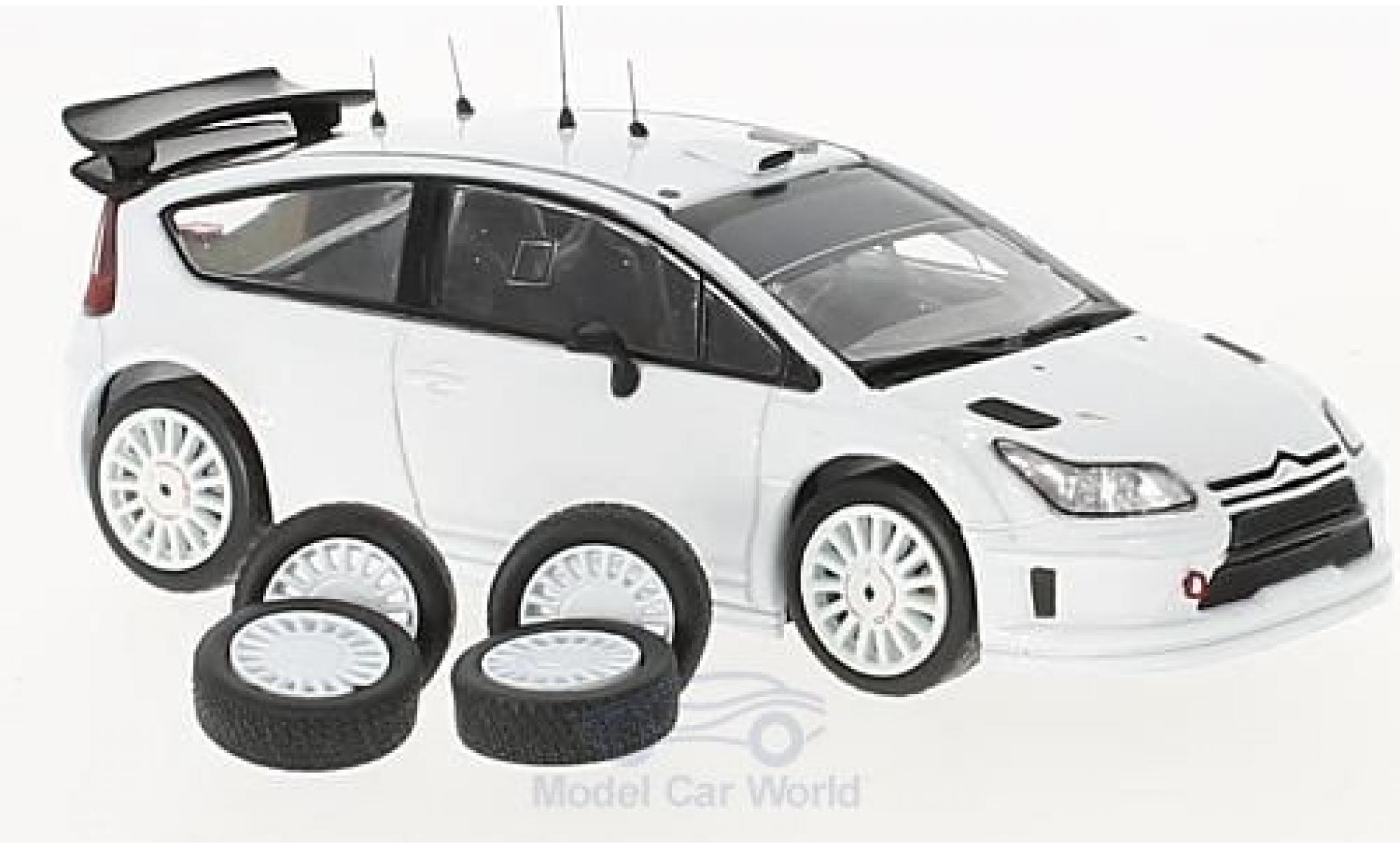 Citroen C4 WRC 1/43 IXO WRC white 2010 Plain Body Version inklusive 4 Ersatzr&auml;der diecast model cars