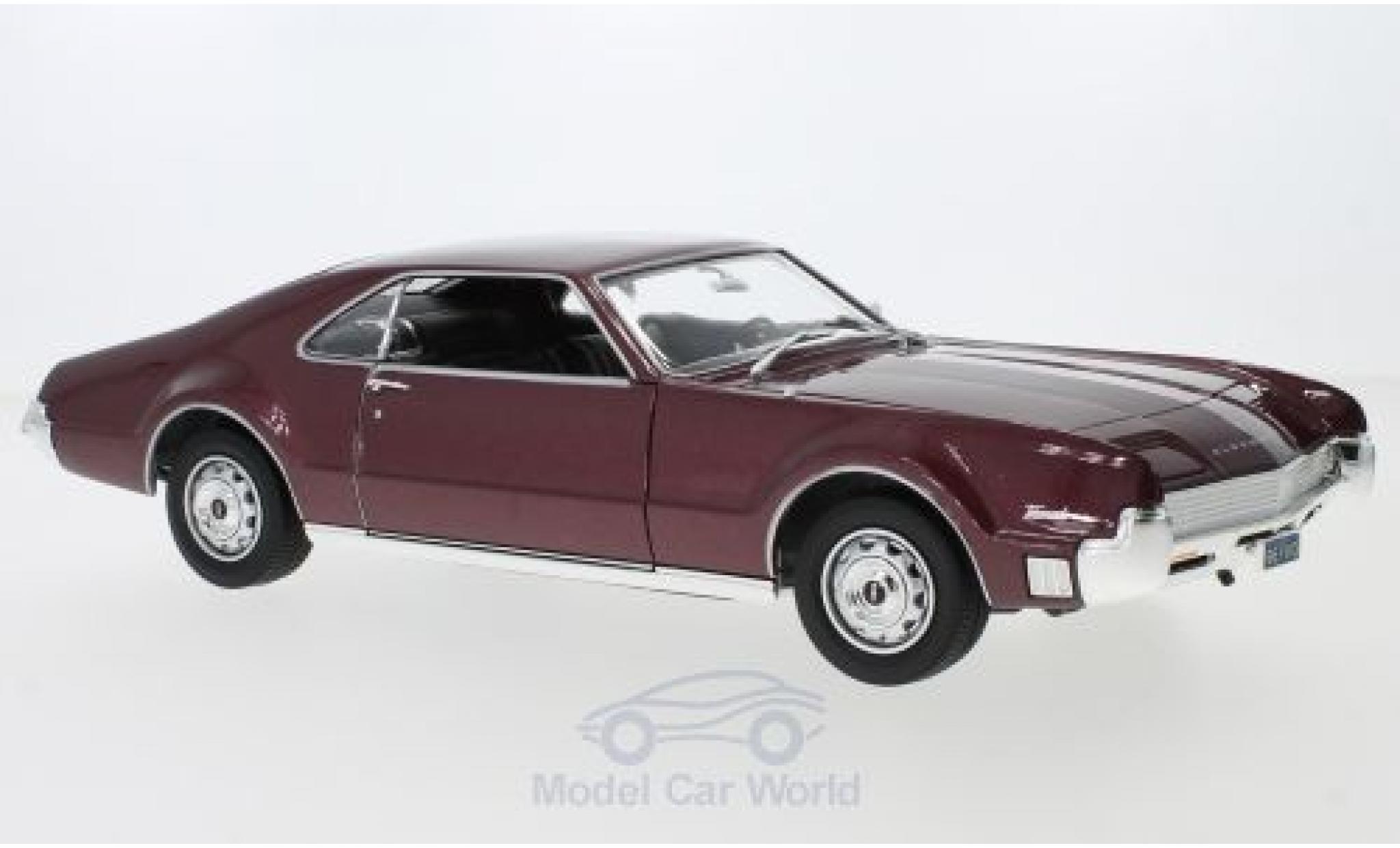 Oldsmobile Toronado 1/18 Lucky Die Cast metallic red 1966 ohne Vitrine diecast model cars