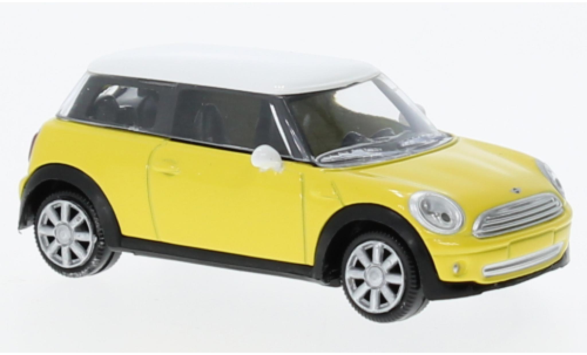 Mini Cooper 1/64 Norev un yellow 2006 diecast model cars