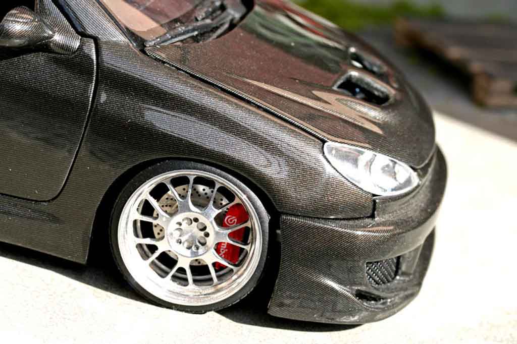 Peugeot 206 CC carbon covered 1/18 Solido
