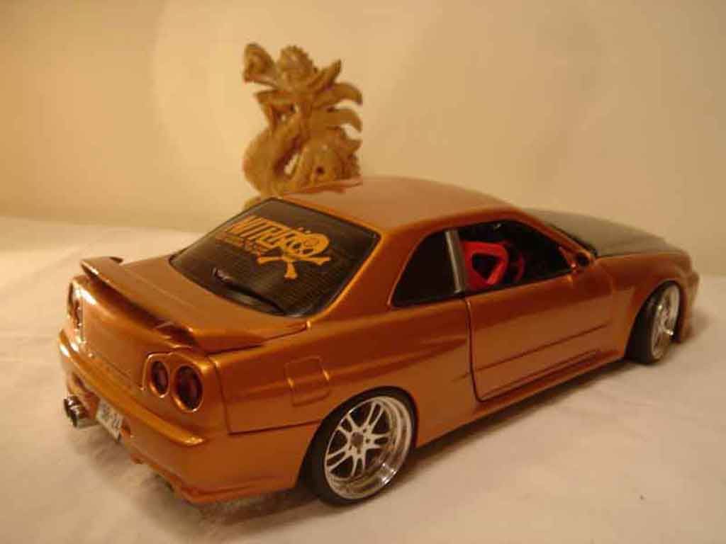 Nissan Skyline R34 orange carbon kit nos 1/18 Autoart