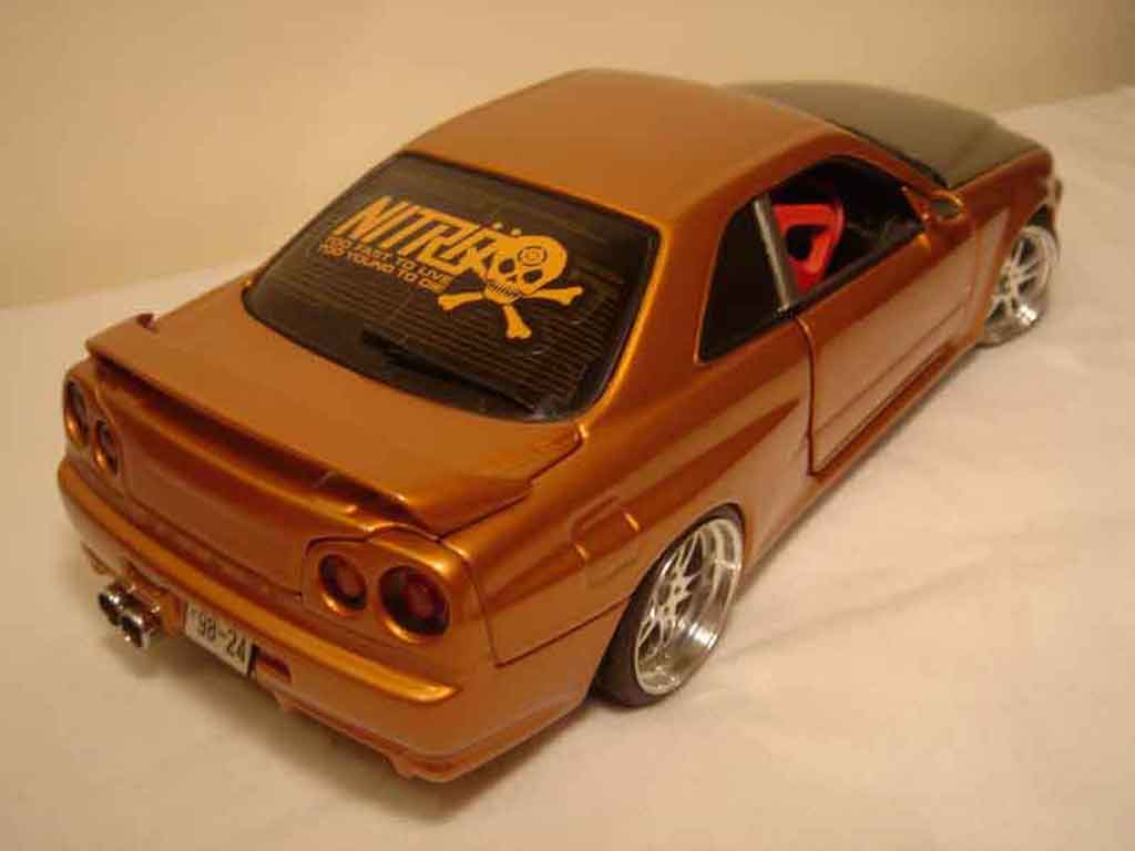 Nissan Skyline R34 orange carbon kit nos 1/18 Autoart