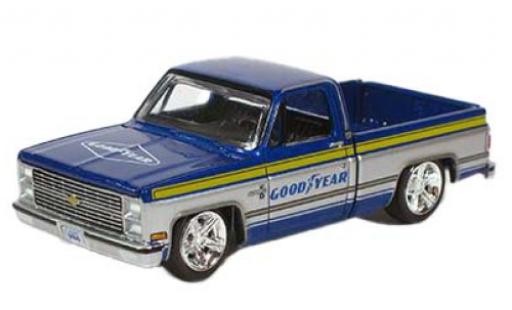 Diecast model cars Chevrolet Silverado pickup Goodyear 1983 1/64 Auto World
