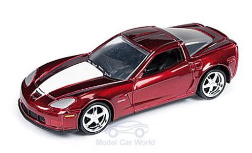 Diecast model cars Chevrolet Corvette Z06 (C6) Special Version red/white 2012 without Vitrine 1/64 Auto World