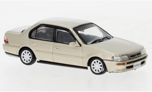 Diecast model cars Toyota Corolla AE100 metallise beige 1996 1/64 BM Creations