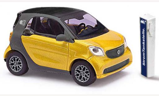 Diecast model cars Smart ForTwo Electric Drive gold 2014 1/87 Busch