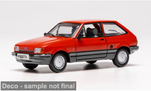 Diecast model cars Ford Fiesta Berline MK II red 1984 1/43 IXO