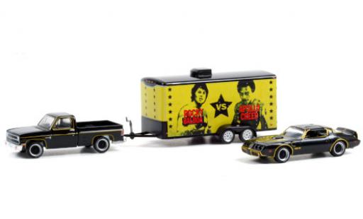 Diecast model cars Chevrolet C-10 Pickup Custom Deluxe black/gold 1981 with 1979 Pontiac Firebird Trans Am and Zweiachstrunkanh&Atilde;&curren;nger Rocky II 1/64 Greenlight