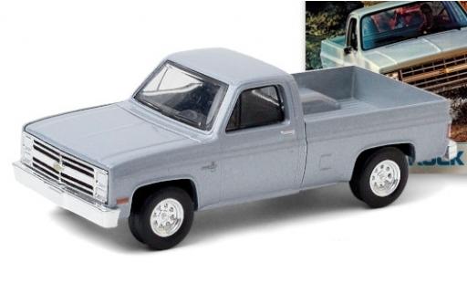 Diecast model cars Chevrolet Silverado pickup metallic grey 1985 1/64 Greenlight