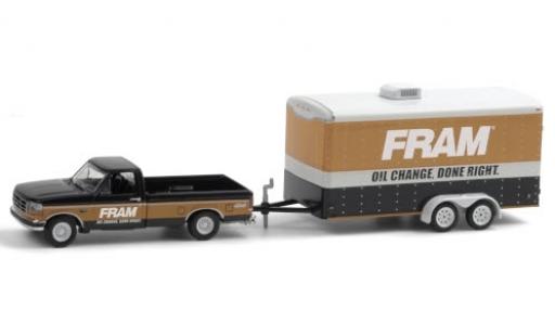 Diecast model cars Ford F-150 XLT 50 FRAM 1994 avec Zweiachs-wagon conteneur 1/64 Greenlight