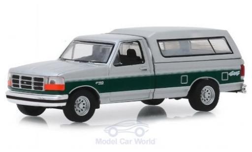 Diecast model cars Ford F-150 XLT 50 grey/green 1996 1/64 Greenlight