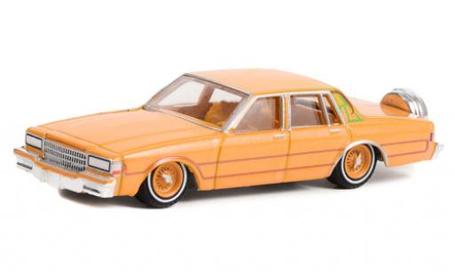 Diecast model cars Chevrolet Caprice Classic Sedan orange/Dekor 1990 1/64 Greenlight