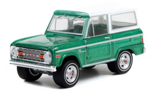 Diecast model cars Ford Bronco Wagon metallise green/white 1977 1/64 Greenlight