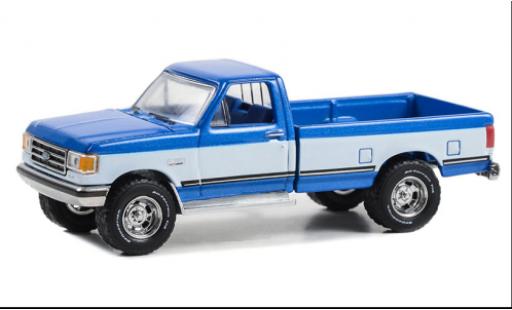 Diecast model cars Ford F-150 XLT 50 Lariat metallise blue/white 1988 1/64 Greenlight