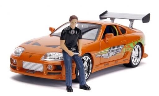Diecast model cars Toyota Supra Fast & Furious metallic orange/Dekor 1995 avec figurine et Scheinwerferfunktion 1/18 Jada Toys