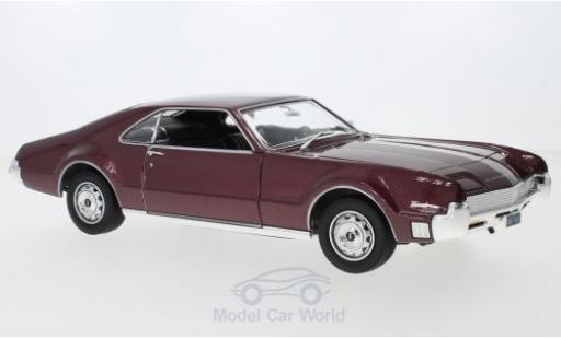 Diecast model cars Oldsmobile Toronado Base metallic red 1966 without Vitrine 1/18 Lucky Die Cast