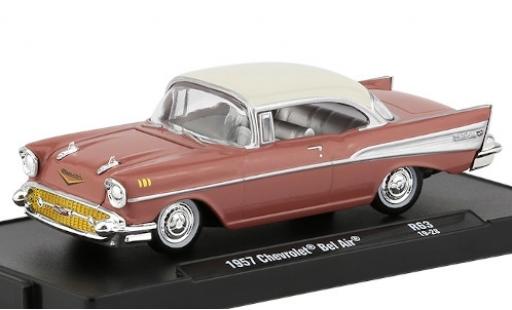 Diecast model cars Chevrolet Bel Air Coupe pink/white 1957 1/64 M2 Machines