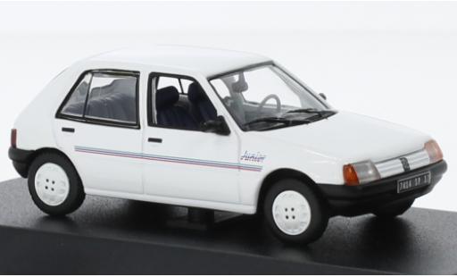 Diecast model cars Peugeot 205 Junior white 1988 1/43 Norev