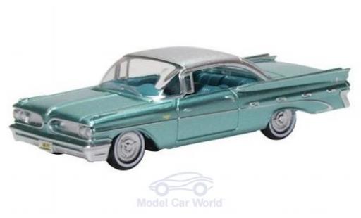 Diecast model cars Pontiac Bonneville Coupe green 1959 1/87 Oxford