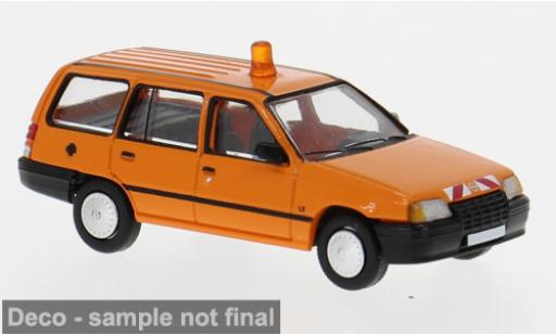 Diecast model cars Opel Kadett E Caravan E orange 1985 Kommunal 1/87 PCX87