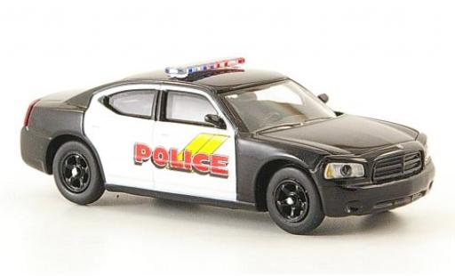 Diecast model cars Dodge Charger police black/white (USA) without Vitrine 1/87 Ricko