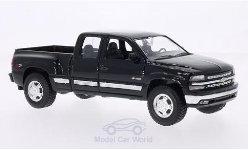 Diecast model cars Chevrolet Silverado pickup black 1999 1/24 Welly