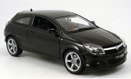 Diecast model cars Opel Astra GTC black 2005 1/18 Welly